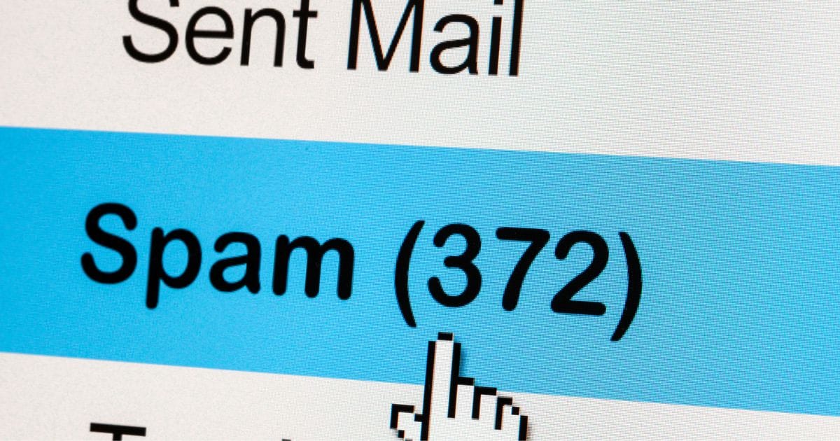 Screenshot showing a mouse cursor pointing at the spam folder of an email box with 372 emails in it.